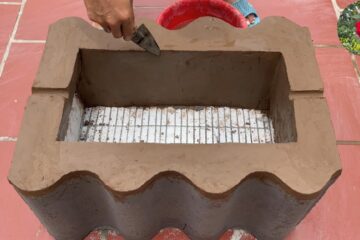 Details on how to make a multipurpose stove from clay roofing sheets and cement simple and effective